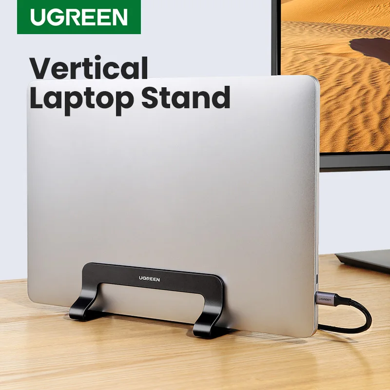 A10a8cb5f69f64806b1a71e6ca9957f4bk.webp UGREEN Vertical Laptop Stand For MacBook Pro Aluminum Portable Notebook Stand Laptop Support MacBook Air Pro Tablet Phone Stand - Image 1