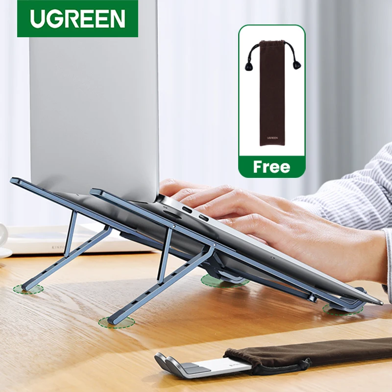 S4e7ada4785c7496ca6d6e437d165a620K.webp UGREEN Laptop Stand For Macbook Air Pro Foldable Aluminum Vertical Notebook Stand Laptop Support Macbook Pro Tablet Phone Stand - Image 1